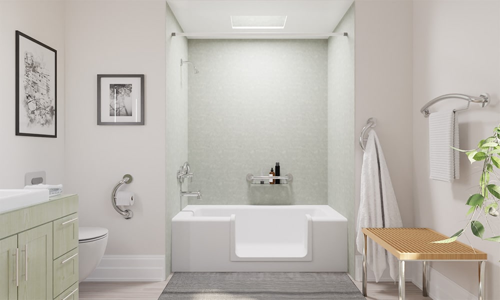 An accessible bathroom with a tub cut. 
