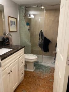 Broken glass shower door